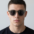 Model wearing Ghost sunglasses